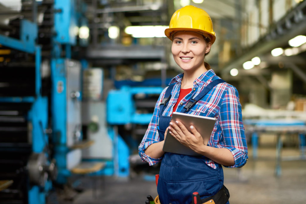 happy young woman at factory ZSGTF5X 1024x684 1